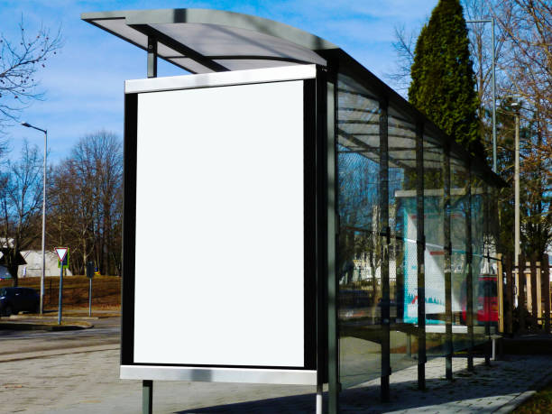 image collage of bus shelter at a bus stop of clear glass and aluminum frame stock photo