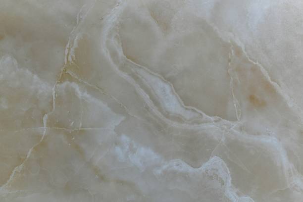 istock Natural beige polished marble with diagonal wavy lines. 1210906636