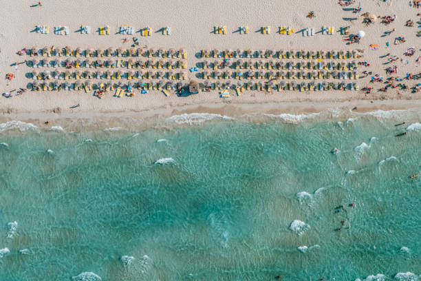 istock aegean beach bird's eye view with people 1210908672