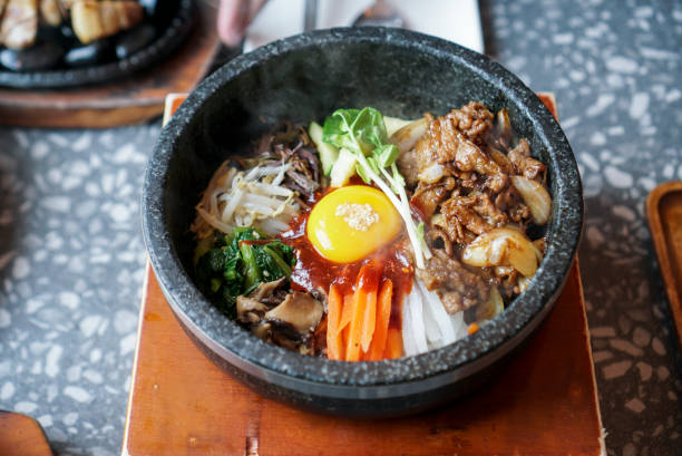 istock Bibimbap with pork and egg yolk. 1210909876