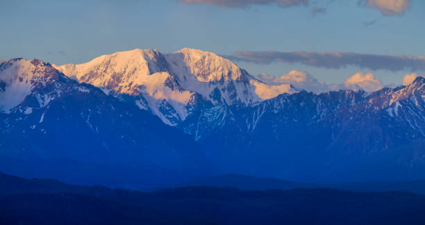 istock Mountain peaks at sunrise, panorama landscape 1210911134