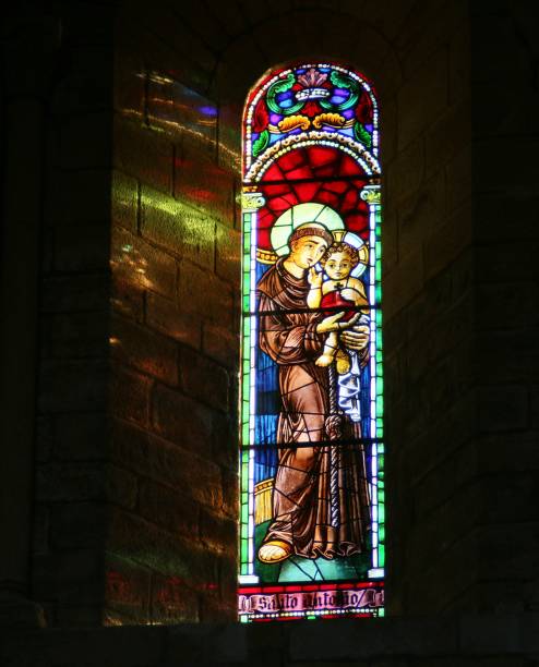 Window of the cathedral of Porto. Stained glass window with the image of Saint Anthony in the cathedral of Porto (Portugal) seen from the inside. st anthony of padua stock pictures, royalty-free photos & images