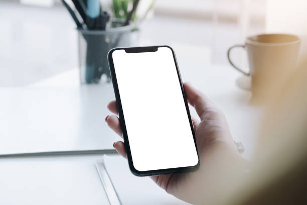 istock woman using Smartphone. Blank screen mobile phone for graphic display montage.networking service. 1210915149