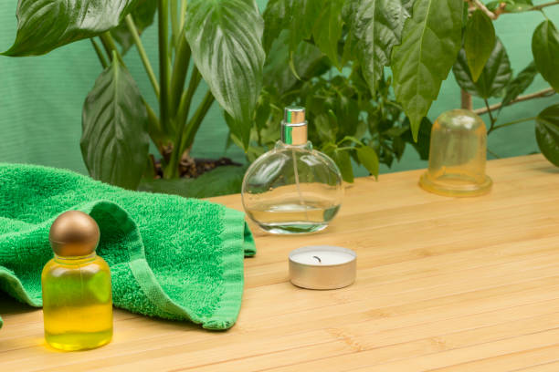 istock Candle with green leaves. SPA relaxation concept 1210915630