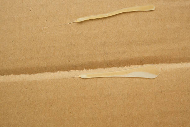 istock Brown eco recycled cardboard paper sheet texture background 1210916720