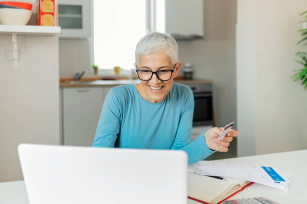 istock Woman Making Online Payments 1210924952