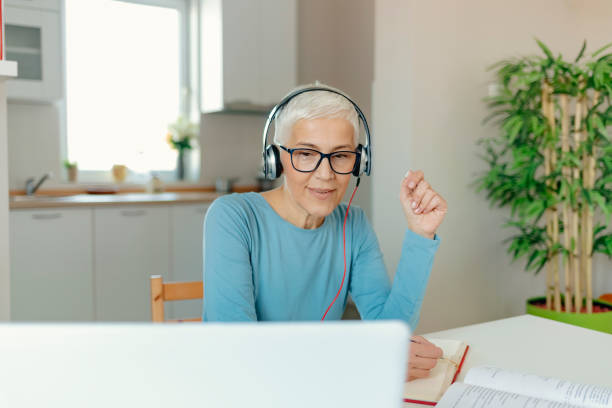 istock Senior Woman Learning Online 1210925782