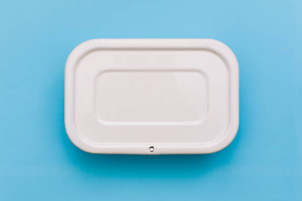 istock White container for food on a blue background. Packaging for storing breakfast, dinner or lunch. 1210926131