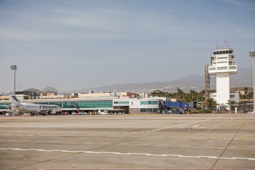 Tenerife South-Reina Sofia Airport, Tenerife, Spain, February 12, 2020:  Airport buildings and airplanes in the main airport at Tenerife