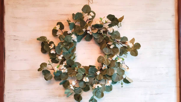 istock Wreath on a wooden wall. 1210931522