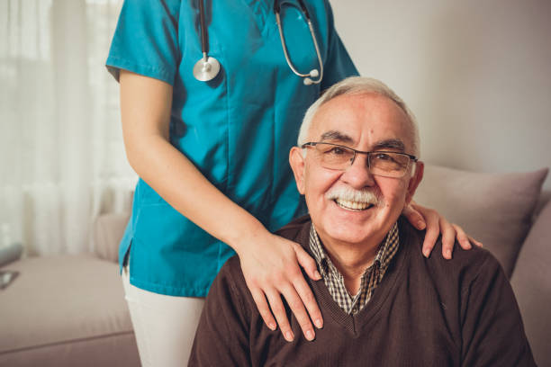 istock Smiling senior man staying in nursing home 1210931726