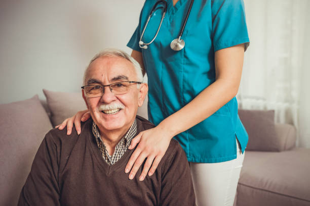 istock Image of elderly man having private home care 1210931758