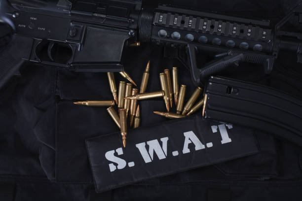 istock Special weapons and tactics team equipment on black uniform 1210933887
