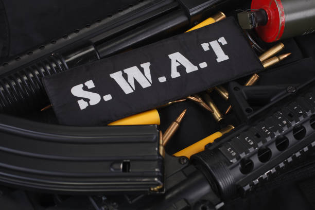 istock Special weapons and tactics team equipment on black uniform 1210933971