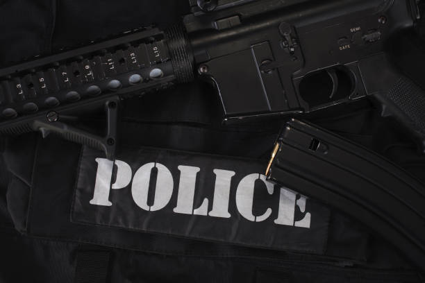 istock Special weapons and tactics team equipment on black uniform 1210934812
