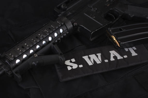 istock Special weapons and tactics team equipment on black uniform 1210934845