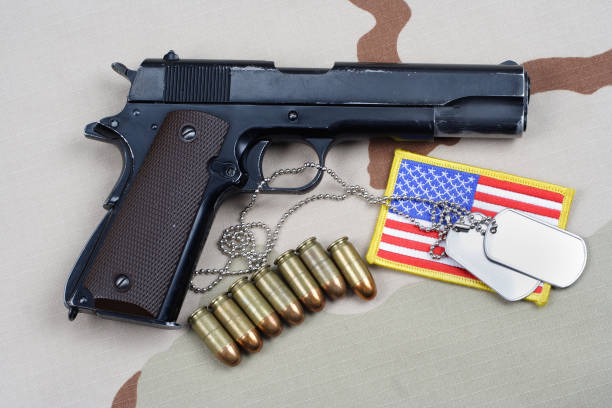 istock Colt government 1911 with U.S. ARMY uniform 1210935507