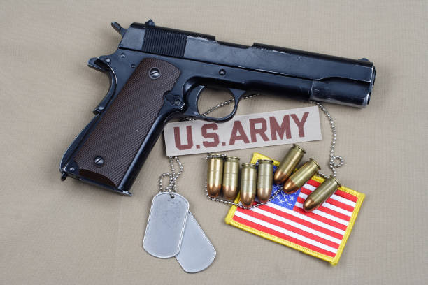 istock Colt government 1911 with U.S. ARMY uniform 1210935526