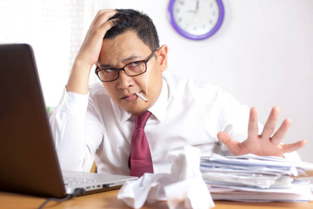 stressed-smoking-businessman-failure-concept.jpg
