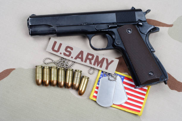istock Colt government 1911 with U.S. ARMY uniform 1210935547