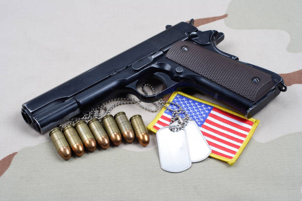 istock Colt government 1911 with U.S. ARMY uniform 1210936071