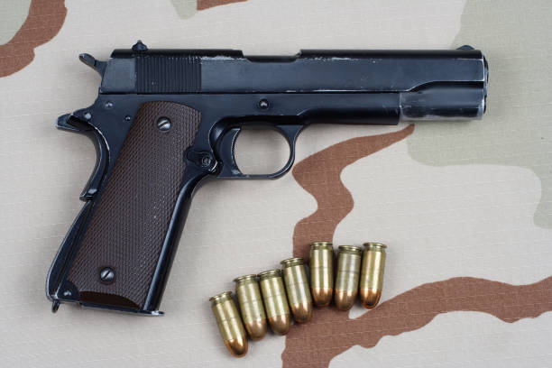 istock Colt government 1911 with U.S. ARMY uniform 1210936079