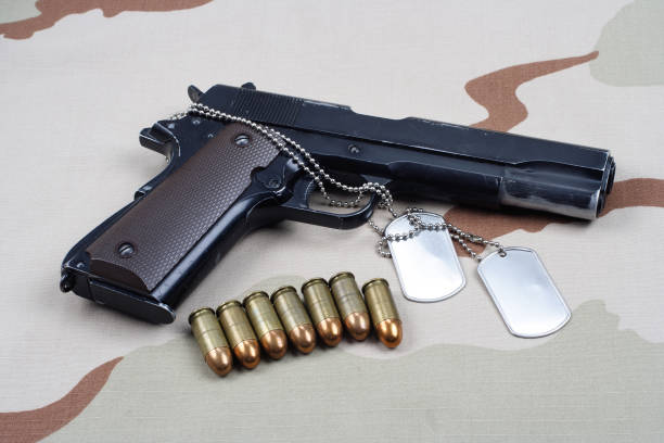istock Colt government 1911 with U.S. ARMY uniform 1210936133
