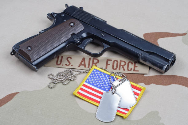 istock Colt government 1911 with U.S. AIR FORCE uniform 1210936155