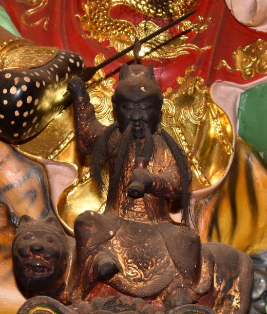 istock Wooden warrior statue at a Chinese temple 1210939277