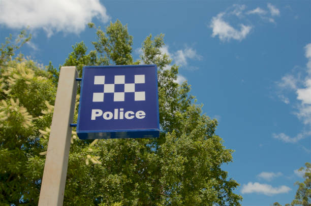 Australian police sign Eumundi, Queensland, Australia - 1st February 2020: View of the australian Police sign against a blue sky located outside a police station in Eumundi, Queensland police station stock pictures, royalty-free photos & images