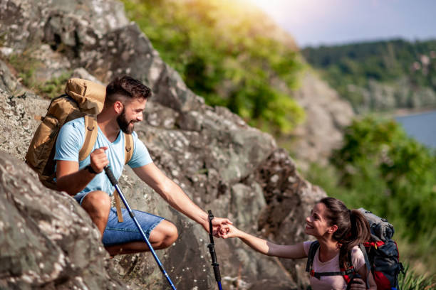 istock Loving couple walk on the mountain 1210939341
