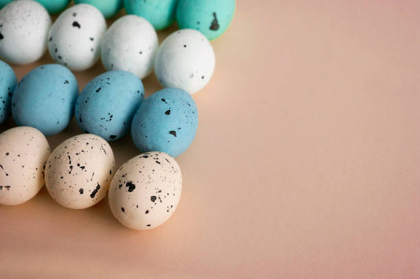 istock eggs,Pastel color, easter colorful decor on beige backgground. 1210941766