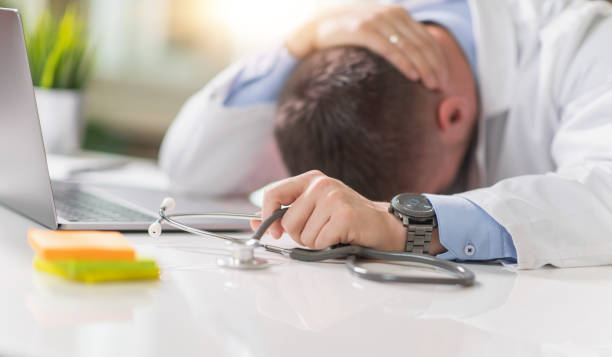 istock Doctor at hospital working with laptop 1210945129