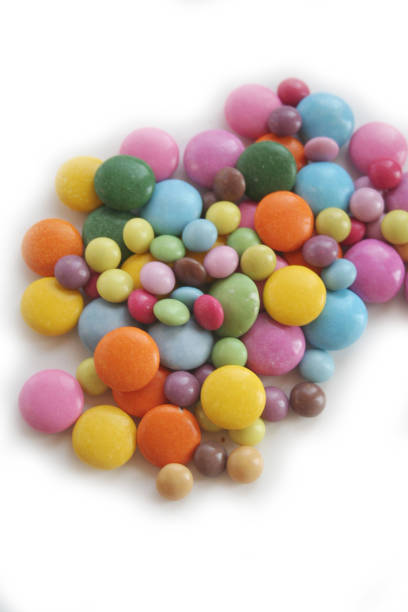 istock Bunch of chocolate candies with coloful glazes on white 1210946280