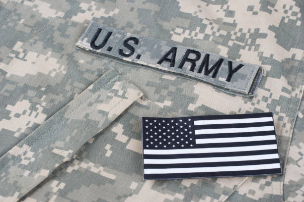 istock US flag patch with dog tag on Army Combat Uniform 1210948496