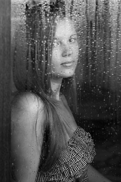 istock girl and rainy window 121094922