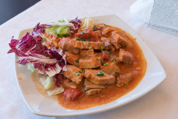 istock Stew with tomato sauce and onion 1210949407