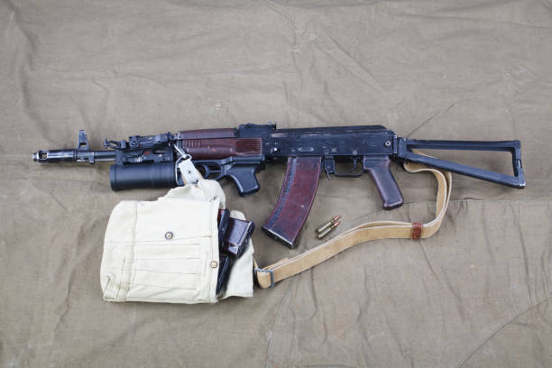 istock Kalashnikov AK 74 with underbarrel grenade launcher on canvas 1210949641