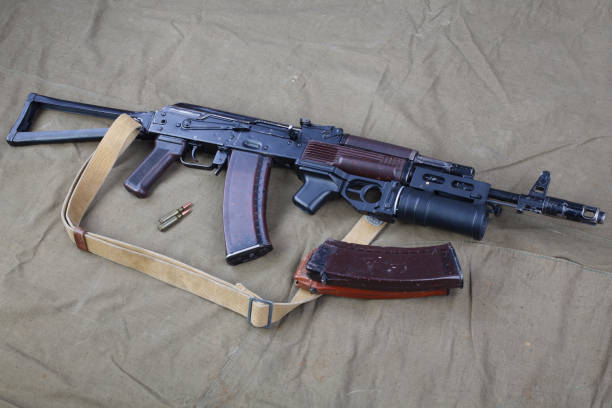 istock Kalashnikov AK 74 with underbarrel grenade launcher on canvas 1210949657