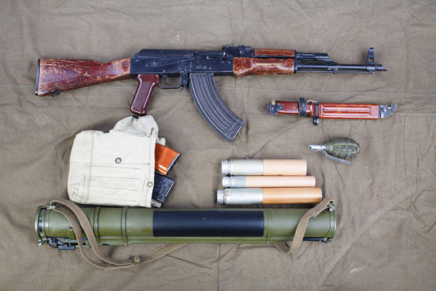 istock Kalashnikov AK 47 with ammunitions on canvas 1210949707