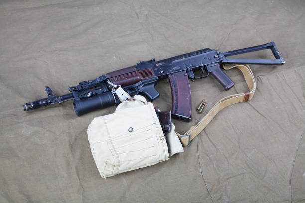 istock Kalashnikov AK 74 with underbarrel grenade launcher on canvas 1210949720