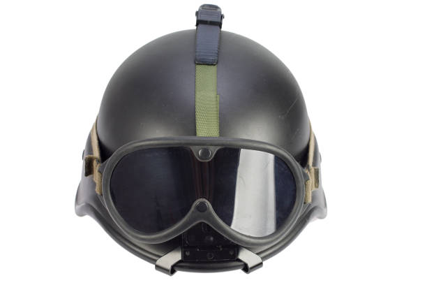istock army black kevlar helmet with goggles 1210949890