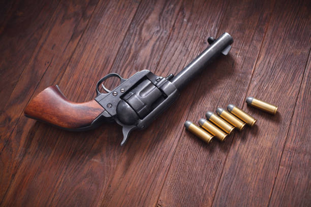 istock Old revolver with cartridges 1210951019