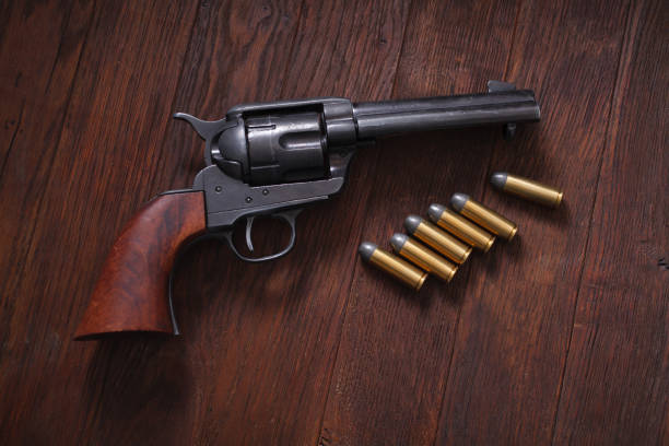 istock Old revolver with cartridges 1210951044