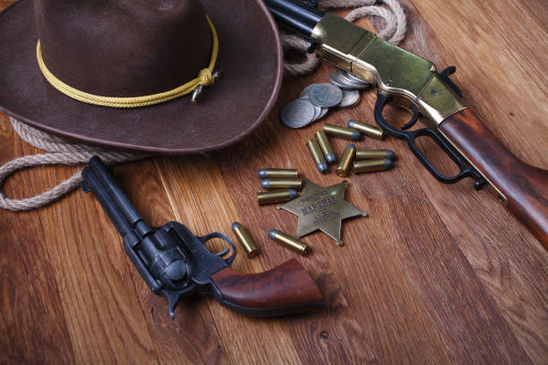 istock Wild west rifle, ammunition and sheriff badge 1210955496