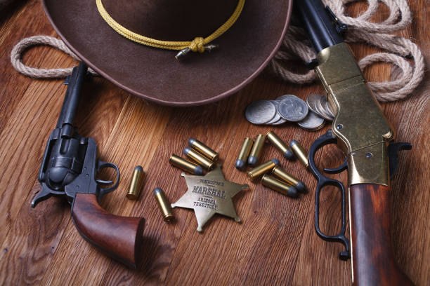istock Wild west rifle, ammunition and sheriff badge 1210955565