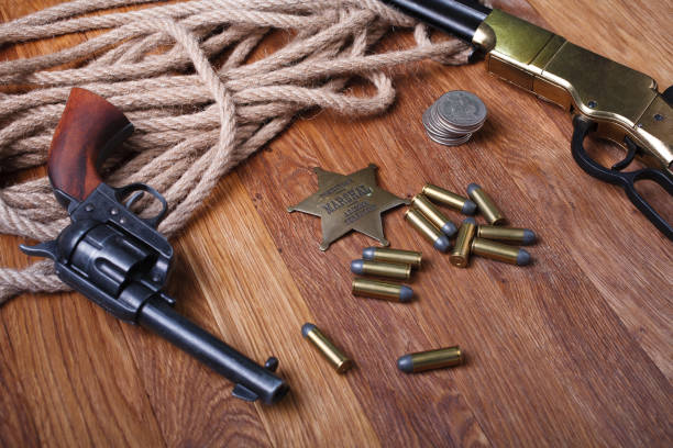 istock Wild west rifle, ammunition and sheriff badge 1210955783