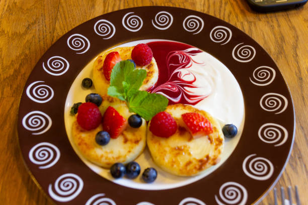 Pancakes with strawberries and blackberries