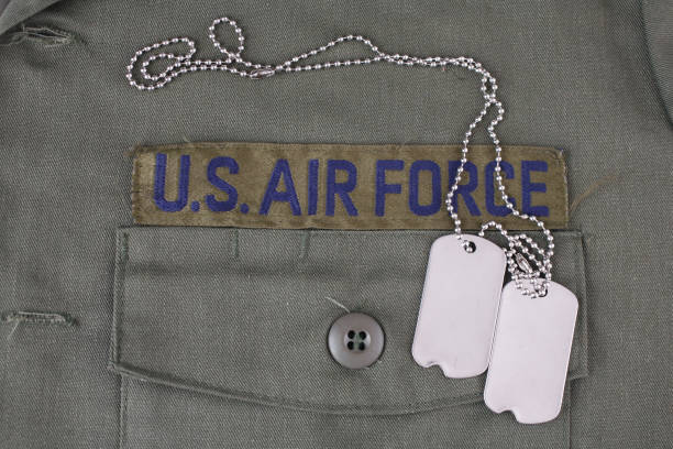 istock U.S. AIR FORCE Branch Tape with dog tags on olive green uniform 1210970412