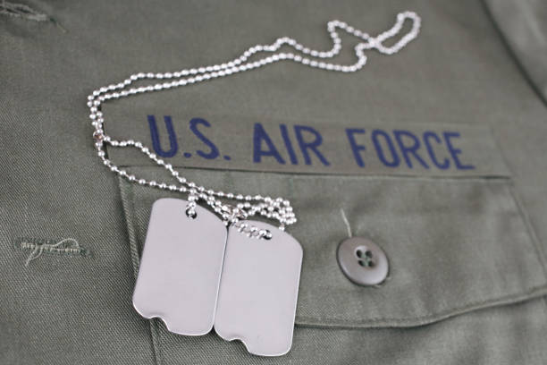 istock U.S. AIR FORCE Branch Tape with dog tags on olive green uniform 1210970575